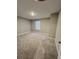 Bright bedroom with neutral walls, plush carpeting, and a window letting in natural light at 696 Scarsdale Ln, Danville, IN 46122
