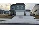 Charming two-story home with a two car garage and manicured landscaping at 696 Scarsdale Ln, Danville, IN 46122