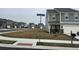 Neighborhood street view showcasing the home's location in the community at 696 Scarsdale Ln, Danville, IN 46122