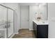 Bathroom features modern dual sink vanity and glass shower at 211 Walker Dr, Whiteland, IN 46184