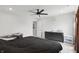 Cozy bedroom with a ceiling fan, a double dresser, and neutral decor at 211 Walker Dr, Whiteland, IN 46184