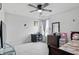 Bedroom with a desk, dresser, and window, creating a functional and inviting space at 211 Walker Dr, Whiteland, IN 46184