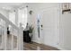 Bright foyer with neutral walls and wood look floors at 211 Walker Dr, Whiteland, IN 46184