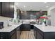 Charming kitchen boasts an island and stainless steel appliances at 211 Walker Dr, Whiteland, IN 46184