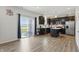 Modern kitchen featuring stainless steel appliances, an island, and dark cabinets at 211 Walker Dr, Whiteland, IN 46184