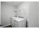 Functional laundry room equipped with a modern washer and dryer setup at 211 Walker Dr, Whiteland, IN 46184