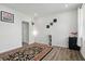 Spacious living room with hardwood floors and decorative wall art at 211 Walker Dr, Whiteland, IN 46184