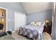 Serene bedroom with vaulted ceilings, double-door closet and natural light at 6093 Boulder Ct, Columbus, IN 47201