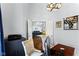 Home office with view into Gathering room, hardwood floors, and built-ins at 6093 Boulder Ct, Columbus, IN 47201