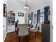 Bright home office features built-in shelving and hardwood floors at 6093 Boulder Ct, Columbus, IN 47201