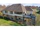 Two-story house with deck, screened porch, and large backyard at 6093 Boulder Ct, Columbus, IN 47201