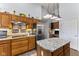 Modern kitchen with granite countertops, stainless steel appliances, and ample cabinetry at 6093 Boulder Ct, Columbus, IN 47201