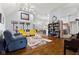 Open concept living area with hardwood floors, built-in shelving and lots of natural light at 6093 Boulder Ct, Columbus, IN 47201