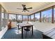 Screened porch with table and chairs, overlooking backyard at 6093 Boulder Ct, Columbus, IN 47201