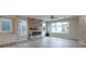Gathering room boasts a stone fireplace and large windows at 5286 Stonehaven Ln, Columbus, IN 47201