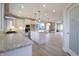 Modern kitchen features granite countertops and a large island at 5286 Stonehaven Ln, Columbus, IN 47201