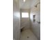 Large walk-in shower with built-in seat and tile surround at 5286 Stonehaven Ln, Columbus, IN 47201