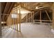 Unfinished attic space with framed walls and dormer windows at 5286 Stonehaven Ln, Columbus, IN 47201