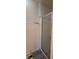 Standard bathroom featuring a walk-in shower with glass doors and a patterned rug at 3230 Meadowcrest Dr, Anderson, IN 46011