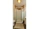 Bathroom featuring a corner shower with a glass enclosure, and a white vanity at 3230 Meadowcrest Dr, Anderson, IN 46011