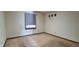Bedroom with beige walls, carpeted floor, a window with blinds, and wall decorations at 3230 Meadowcrest Dr, Anderson, IN 46011