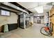 Unfinished basement with HVAC system and storage at 1185 N 10Th St, Noblesville, IN 46060