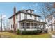 Two-story house with front porch and landscaped yard at 1185 N 10Th St, Noblesville, IN 46060