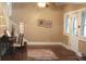 Inviting living room features hardwood floors, neutral walls, and a staircase leading to the upper level at 1185 N 10Th St, Noblesville, IN 46060
