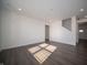 Bright living room with wood floors, recessed lighting, and ample natural light at 9141 Blue Hill St, Indianapolis, IN 46239