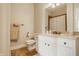 Bright bathroom featuring a white vanity with a granite countertop, neutral walls, and tile flooring at 11492 Hanbury Manor Blvd, Noblesville, IN 46060