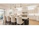 Elegant kitchen featuring custom cabinets, marble countertops, and stainless steel appliances at 11492 Hanbury Manor Blvd, Noblesville, IN 46060