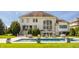 Back exterior view featuring a stunning pool and elegant lounge furniture with the home in the background at 11492 Hanbury Manor Blvd, Noblesville, IN 46060