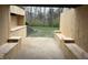 New wooden patio featuring built-in benches and backyard views at 4739 Beechwood Rd, Avon, IN 46123
