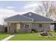 Cozy brick home featuring well-maintained lawn and inviting facade in a residential neighborhood at 2819 Mars Hill St, Indianapolis, IN 46241
