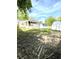 Large backyard with sheds and wooden fence at 2709 E Troy Ave, Indianapolis, IN 46203