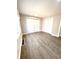 Large main bedroom with hardwood floors and ample closet space at 2709 E Troy Ave, Indianapolis, IN 46203