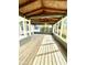 Large wooden screened porch at 2709 E Troy Ave, Indianapolis, IN 46203