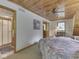 Bedroom with an ensuite bathroom and natural light from a window at 6486 Coyote Dr, Nineveh, IN 46164