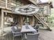 Spacious deck featuring an outdoor dining set with an umbrella, perfect for entertaining or relaxing at 6486 Coyote Dr, Nineveh, IN 46164