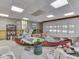 Spacious garage with a canoe, storage shelves, a window, and a white paneled garage door at 6486 Coyote Dr, Nineveh, IN 46164