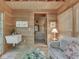 Bright sunroom with beadboard walls, sink and a view to the Primary bedroom at 6486 Coyote Dr, Nineveh, IN 46164