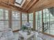 Bright sunroom featuring natural light from windows and skylight at 6486 Coyote Dr, Nineveh, IN 46164