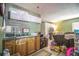 Cozy finished basement with a kitchenette and comfortable seating area at 2925 Highwoods Dr, Indianapolis, IN 46222