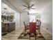 Dining room with modern light fixtures and a seamless flow into the kitchen area at 2925 Highwoods Dr, Indianapolis, IN 46222
