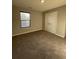 Bedroom featuring carpet, natural light, and a closet at 7108 Parkstay Ct, Indianapolis, IN 46113