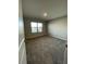 Neutral bedroom with carpet, window, and natural light at 7108 Parkstay Ct, Indianapolis, IN 46113