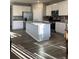 Updated kitchen boasts stainless steel appliances and a large island at 7108 Parkstay Ct, Indianapolis, IN 46113