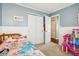 Bright bedroom featuring white trim and large closet at 778 Kingston Cir, Brownsburg, IN 46112