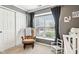 Comfortable Bedroom featuring a rocking chair, closet, and natural light at 778 Kingston Cir, Brownsburg, IN 46112