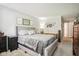 Neutral bedroom with a plush bed, soft carpet, and simple decor at 778 Kingston Cir, Brownsburg, IN 46112